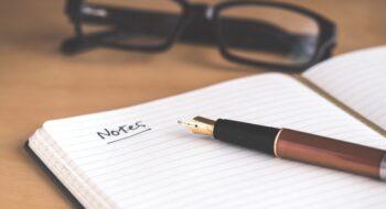 Photo by David Travis brown fountain pen on notebook